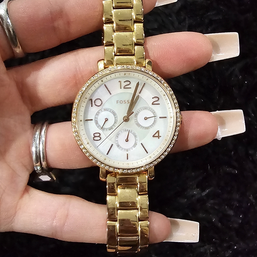 Gold fossil watch